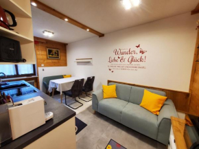 Urlaub am Krausberghof, Appartment mit Balkon und Parkplatz, Aufenthaltsraum, Sauna und Infrarotkabine, kostenfreie Kaffeekapseln, 6 Fahrminuten zur Alpentherme Gastein und zur Schlossalmbahn